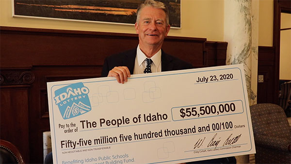 Idaho Governor Brad Little Accepts Dividend Check
